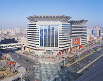 This image is of a downtown city scape in Beijing China and represents the ability of danielsgroup International to serve diverse cultures in ot